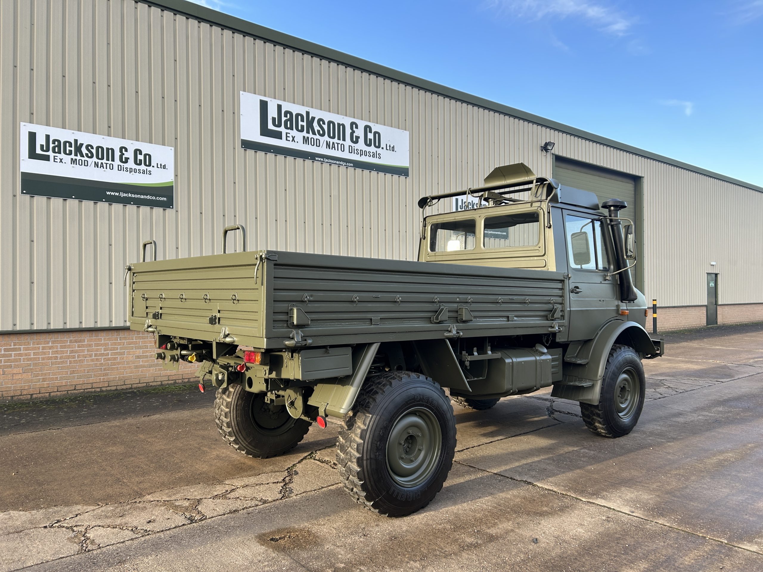 Mercedes Unimog U1300L 4×4 Drop Side Cargo Truck