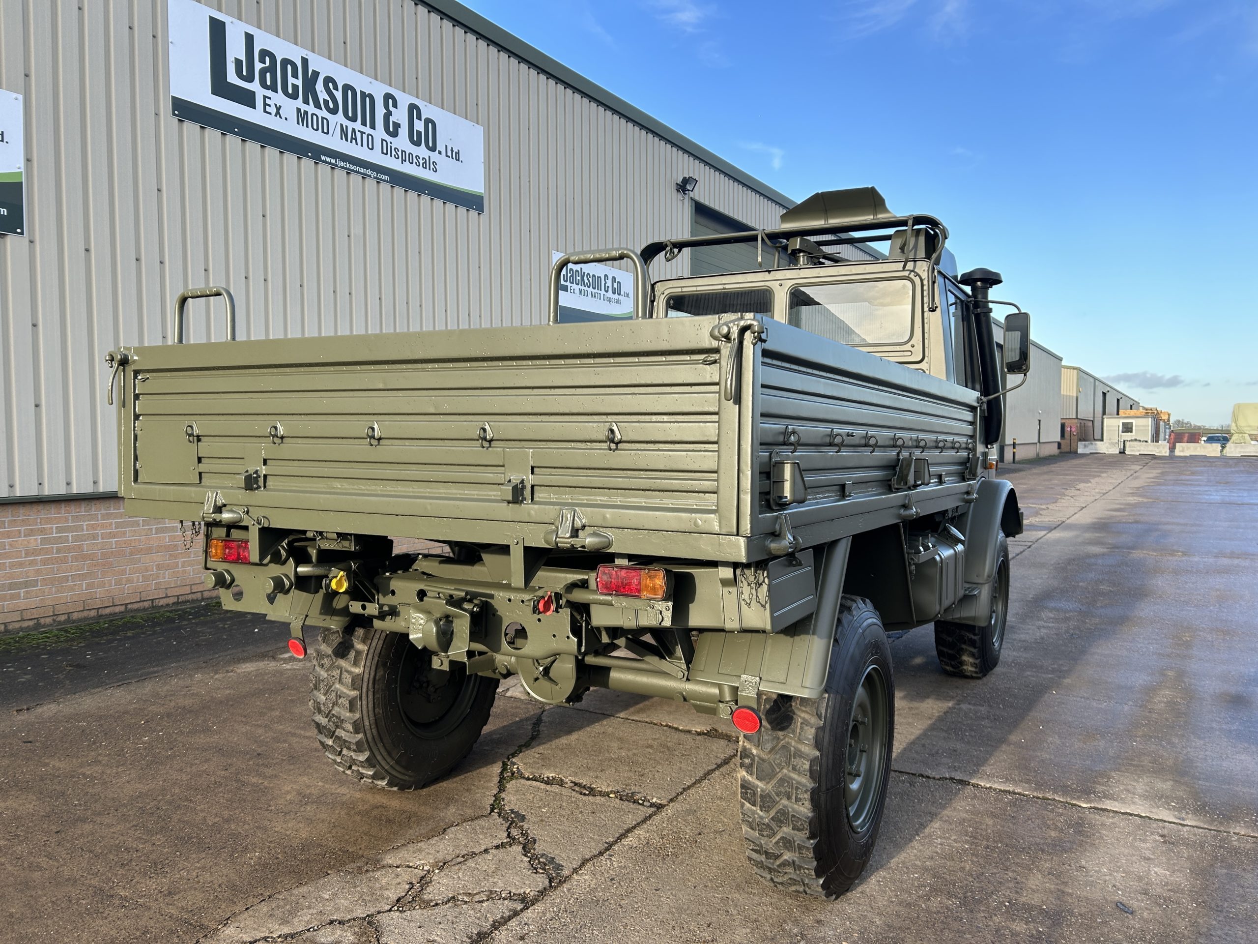 Mercedes Unimog U1300L 4×4 Drop Side Cargo Truck