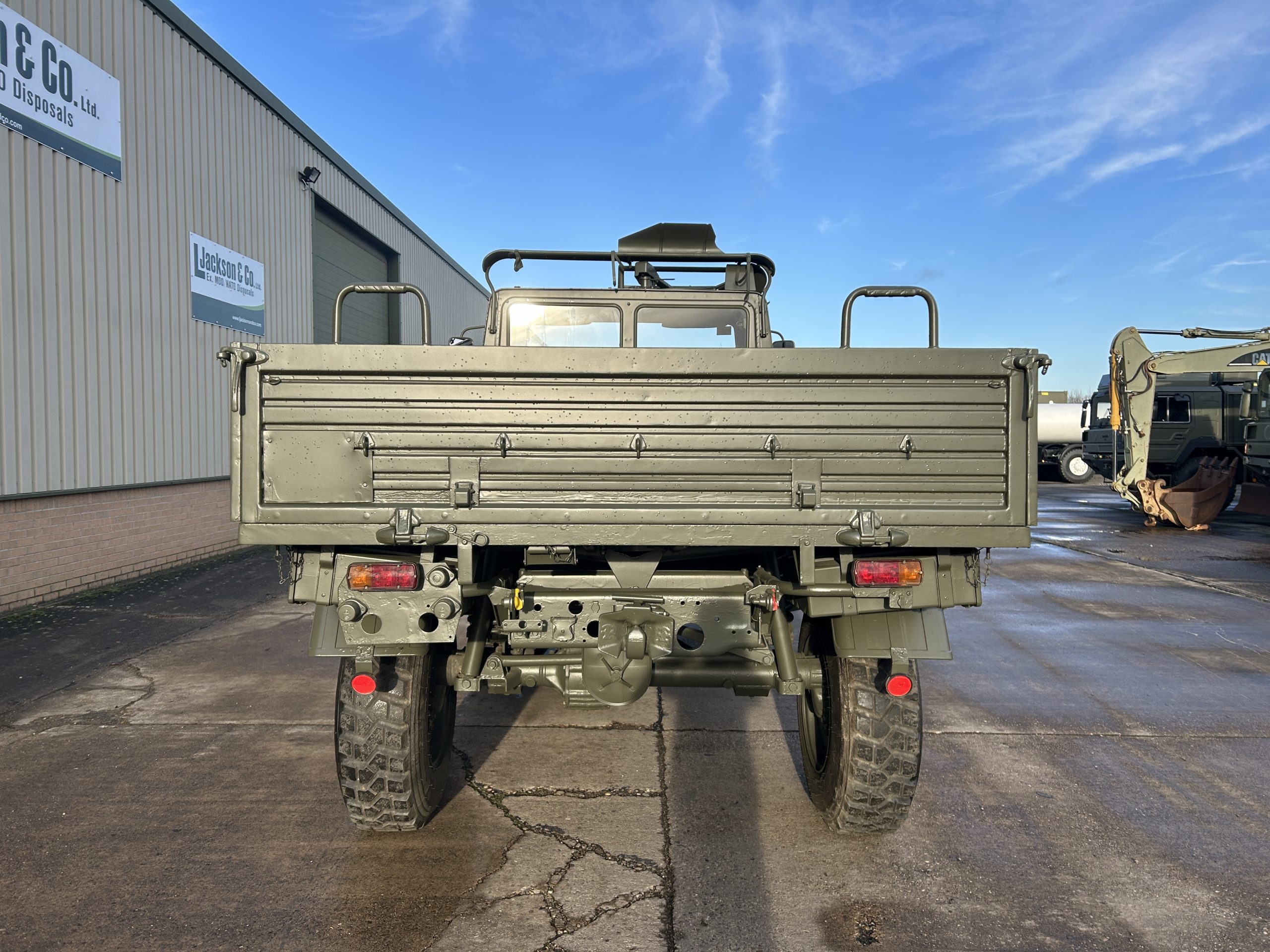 Mercedes Unimog U1300L 4×4 Drop Side Cargo Truck