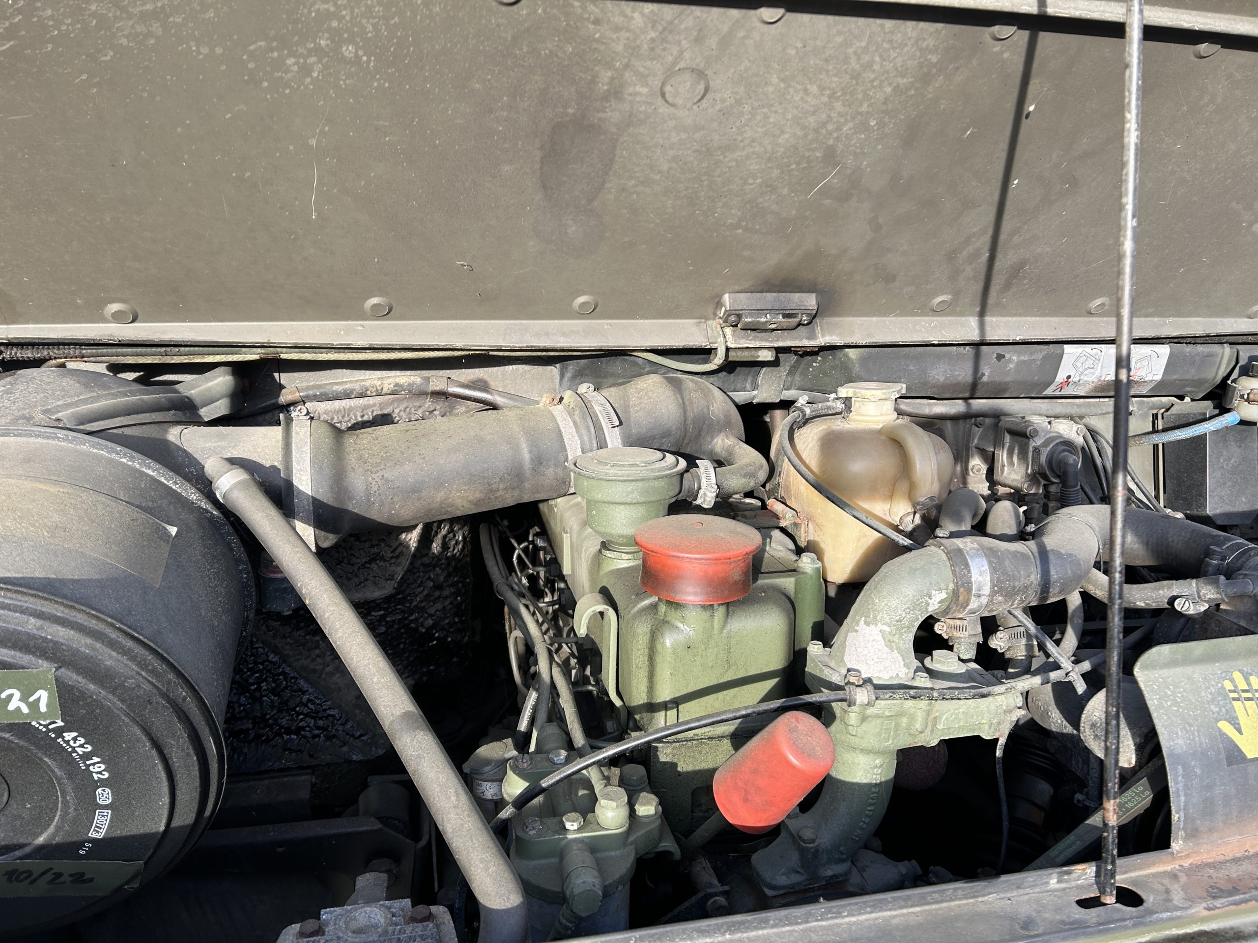 Mercedes Unimog U1300L 4×4 Drop Side Cargo Truck